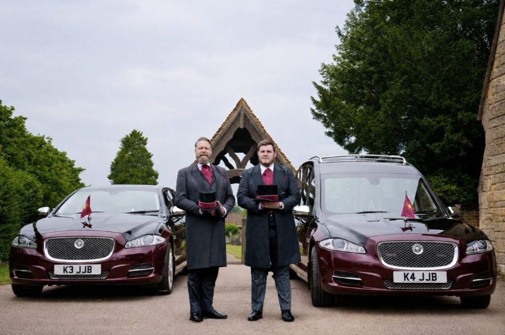 J J Burgess Types of Funerals for best funerals - image of Justin and Jack with hearse and limo